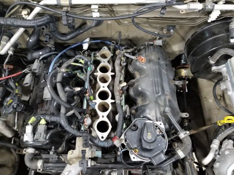 2001 Nissan Xterra - After pulling the upper intake, several hoses & wires had to be disconnected in preparation for pulling the engine. One of the heater core…