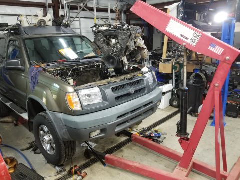 2001 Nissan Xterra - I used a lifting plate I made for a Ford 5.8L (with 3 new holes drilled) to pull the engine by the lower intake, using the plenum bolts & w…