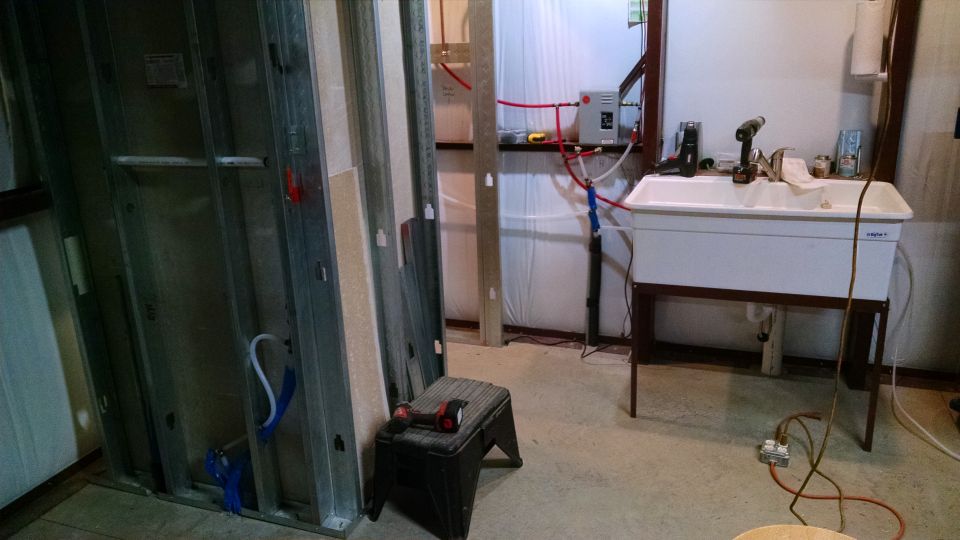 I've been dreading cutting all this cement board for the shower/toilet, but it was overdue.  Now, I have to find someone to tile it for me, and grout the toilet in.