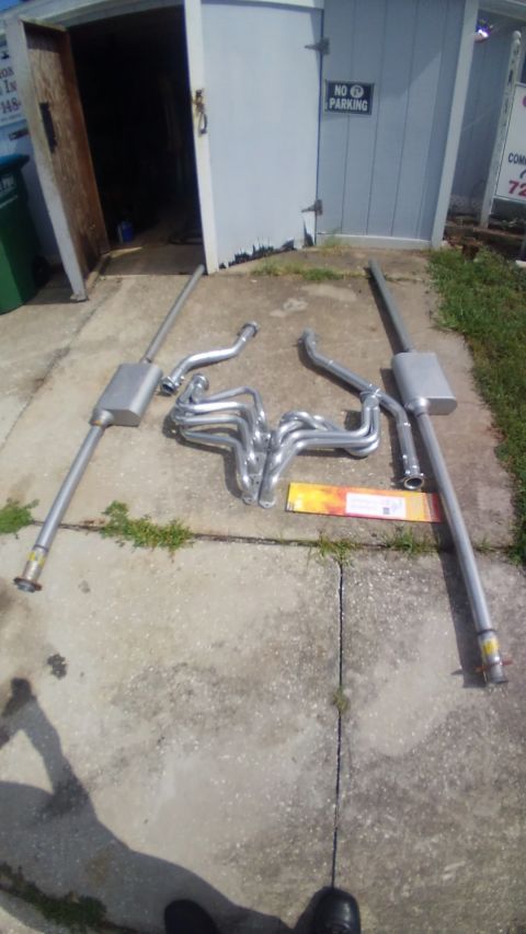 1990 Ford F-250 - new exhaust is done. i had the long tubes headers and the 2 intermidiate pipes taken to a local powdercoating shop to get ceramic coated. t…