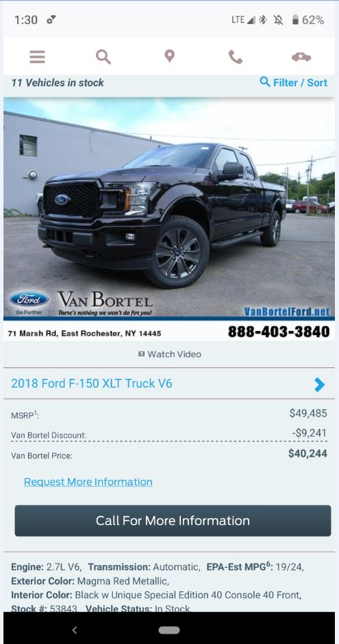 2018 Ford F-150 XLT Truck V6 in black with black wheels, front 3/4 view.