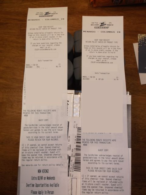 1995 Mercury Grand Marquis - Several Menards receipts are stacked together, showing purchases of Mobil 1 5W-30 oil.