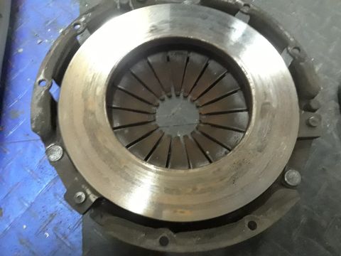 1985 Ford Bronco - Close-up of a clutch pressure plate, a component of the drivetrain.