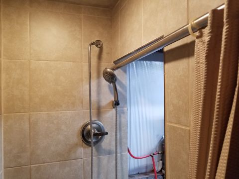 2004 Land Rover Land Rover - Grouting the shower wasn't fun, which is why my friend who did the tile didn't want to do it. But afterward, I got the faucets & curtain in…