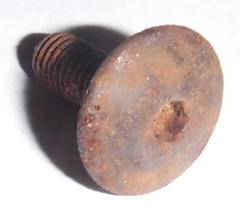 1992 Ford Bronco - Rusty bolt fished from tailgate.