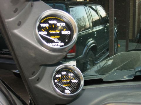 1991 Ford Bronco - Close Up pic of Autometer 2 5/8" Water Temp and Oil Pressure gauges.