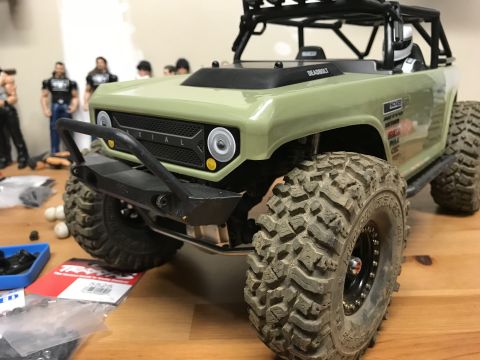 1989 Ford Bronco - This is a toy RC car with "AXIAL" written on the front grille, not a 1989 Ford Bronco.
