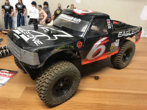 1989 Ford Bronco - This remote control truck has "EAGLE ONE" and "6" graphics on its body.