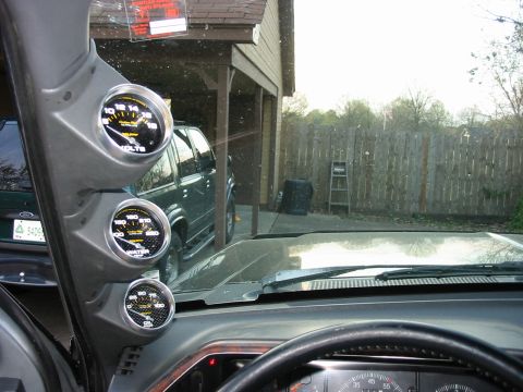 1991 Ford Bronco - All three Autometer gauges mounted on the driver's side A Pillar. Gauges are 2 5/8" Carbon Figer gauges.