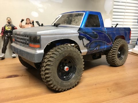 1989 Ford Bronco - This is a remote-controlled truck, not a 1989 Ford Bronco. It has custom flame graphics.