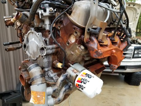 1995 Ford Bronco - I also hit the engine a couple more times with the pressure washer. It was really-effective at removing the water pump gasket, and blasting…