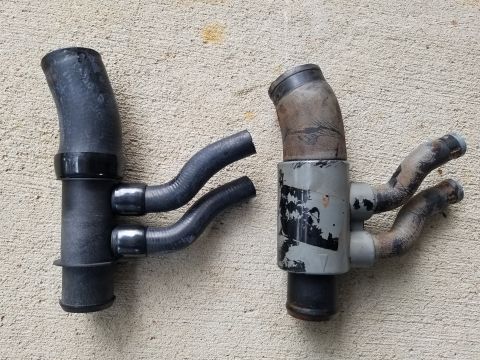 1995 Ford Bronco - As soon as the engine warmed up with the new timing cover gasket, a leak at the oil cooler hose became apparent, so it was replaced with a…
