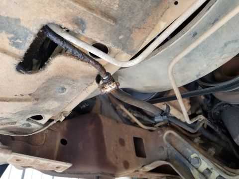 1995 Ford Bronco - The ATF cooler return line is leaking, probably because it's not ATF hose. [url=https://www.supermotors.net/vehicles/registry/media/1142312…