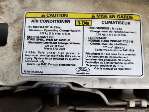1995 Ford Bronco - Refrigerant charge label IF THE IMAGE IS TOO SMALL, click it. Per TSB 94-19-20, the charge shown is correct: 2 lbs 6 oz (38oz) of R-134a, &…