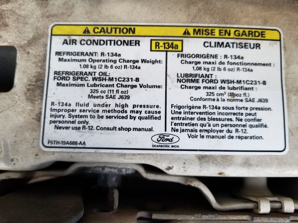 Refrigerant charge label
IF THE IMAGE IS TOO SMALL, click it.

Per TSB 94-19-20, the charge shown is correct: 2 lbs 6 oz (38oz) of R-134a, & 11oz of PAG-46 per TSB 97-10-05. For some reason, TSB 97-15-5 does not indicate the correct oil quantity.
http://www.bbbind.com/free_tsb.html