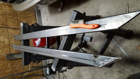 1995 Ford Bronco - These are the rock sliders I plan to mount. Notice the mounting screws welded into them at the front and the back. The front is angled so t…