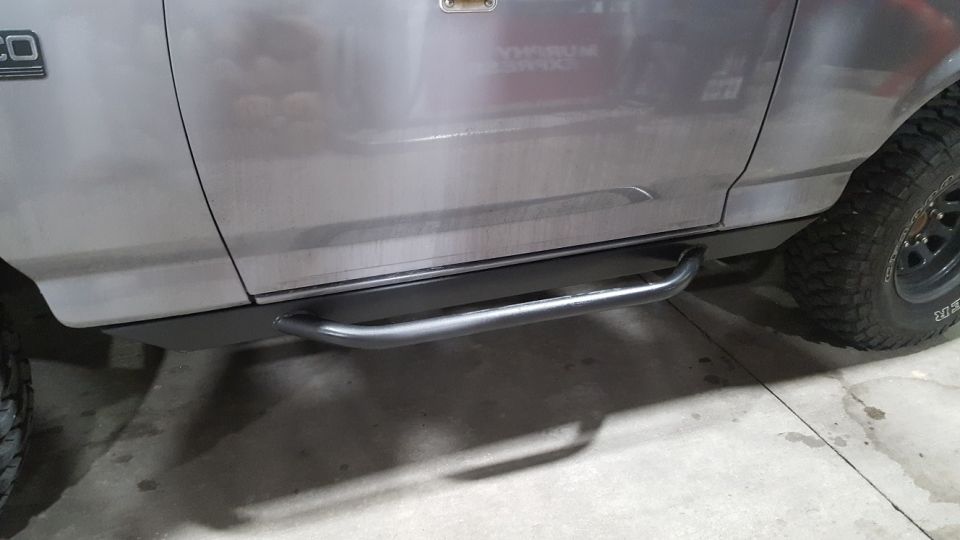 The truck is filthy, but I now have a functional step.  These steps and sliders are ROCK SOLID!  There is no flex.