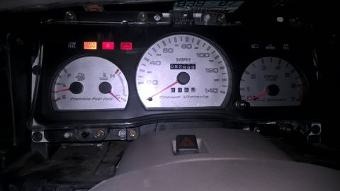 2004 Ford Crown Victoria - The instrument cluster displays the speedometer, fuel level, and engine RPM, with the odometer showing 92,990 miles.