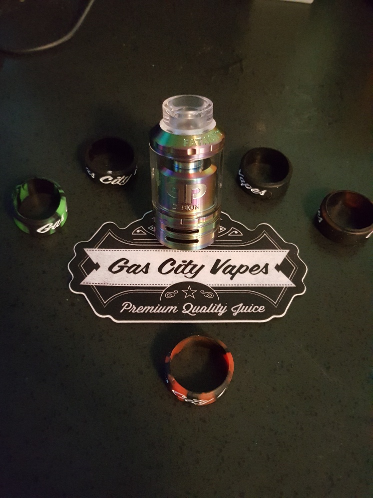 Vape tank with 'Gas City Vapes' logo and accessories
