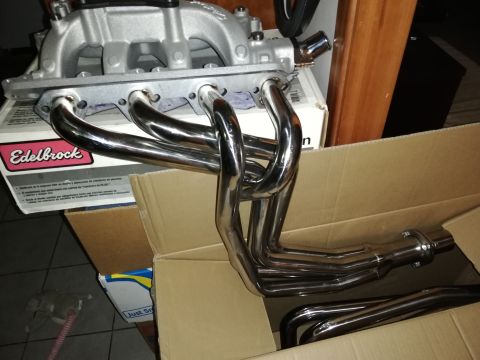 1996 Ford Bronco - Aftermarket performance parts including an Edelbrock intake and exhaust headers are shown.