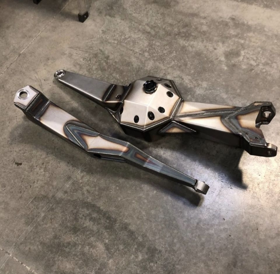 Custom differential housing and control arm on concrete floor