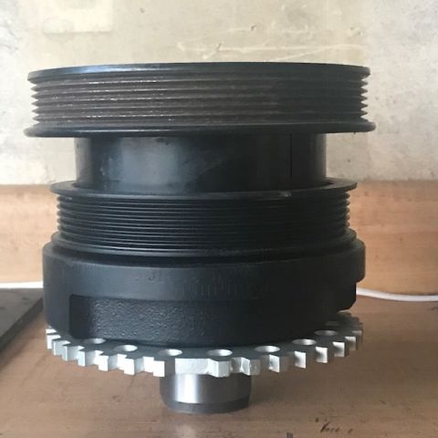 2000 Ford Explorer - This part appears to be a crankshaft pulley with an attached timing gear, not a 2000 Ford Explorer.