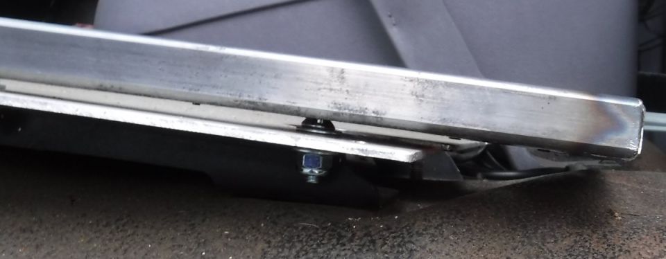 Much more rearward extension than the flexy old aluminum plate adapter.
