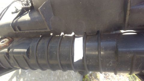 1990 Ford F-250 - the plastic tanks had these ribs so i also grinded slots for them. might hold the fans in place better