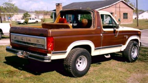 1980 Ford Bronco - This two-tone Ford Bronco is shown from the rear quarter angle, with its top removed.