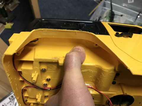1989 Ford Bronco - Close-up of a toy vehicle's interior, revealing internal wiring and construction details.