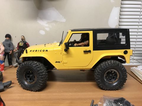 1989 Ford Bronco - RC Jeep Wrangler Rubicon model with "RUBICON" and "Jeep" text visible.
