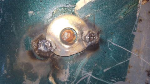 1996 Ford Bronco - to make sure the drill bit would not walk when drilling, i tack welded a grade 8 washer. i will be using 1/2" bolts and this 7/16" washer w…