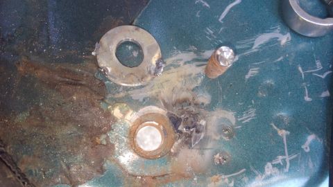1996 Ford Bronco - once drilled through the threaded section of the floor, the rest of the old bolt should fall through. then you can break the tack welds of…