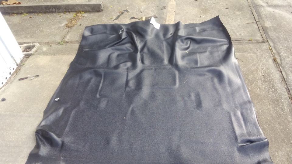 this is the vinyl flooring kit. instructions say to keep it over 72* for a few hours so it will be looser and easier to install. thats not an issue in Florida but i did leave iti n the sun for awhile.

therer are no holes cut and some of the sides may need to be trimmed