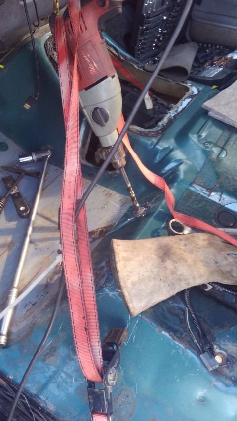 1996 Ford Bronco - a trick i do to keep constant pressure on the drill without alot of effort is use a ratchet strap around the back of the drill. it will kee…