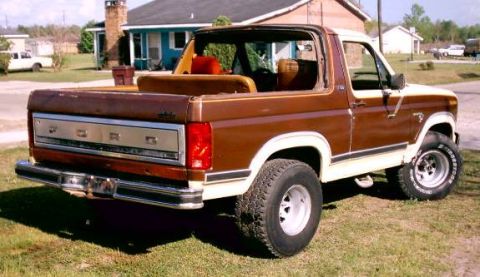 1980 Ford Bronco - This 1980 Ford Bronco is seen from the rear with its top removed, revealing the interior seating.
