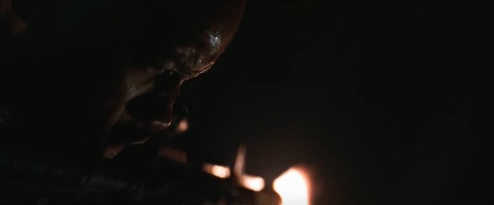 Close-up of a person's face in shadow with a bright light source to the right