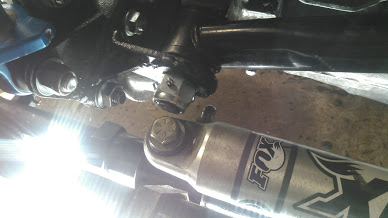 1978 Ford Bronco - Front axle suspension part and FOX shock absorber visible in the image.