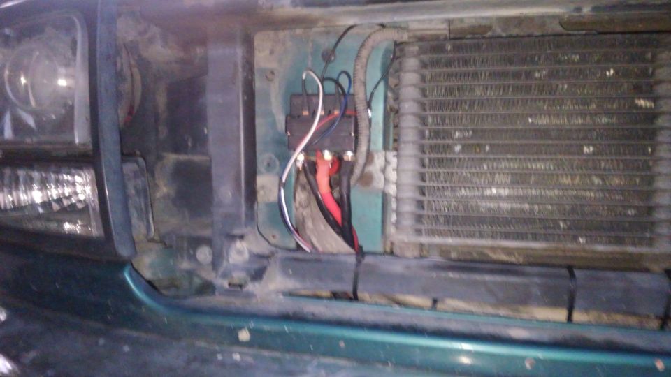 mounted the solenoid pack here where the factory which cables still had plenty of room and it is relativley easy to service. also its up high enough it should not get wet