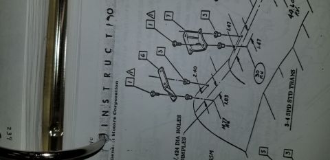 1970 Chevrolet Camaro - Exploded parts breakdown from a Chevrolet assembly instruction sheet showing mounting brackets with numbered callouts and dimensions for st…