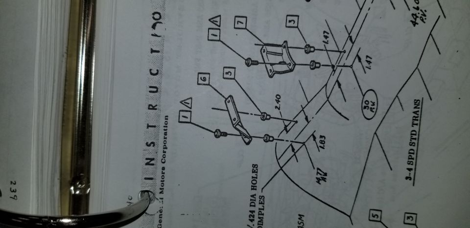 Chevrolet assembly instruction page showing exploded mount brackets with numbered callouts and dimensions