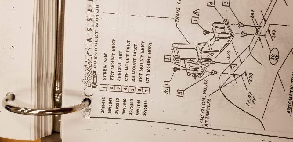 Chevrolet assembly manual page with exploded transmission mount brackets, part numbers and dimensions
