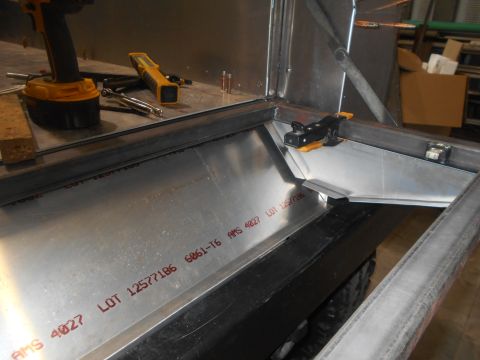 1992 Ford Bronco - Metal fabrication work in progress, with tools and materials visible.