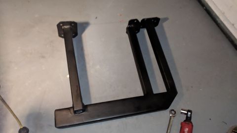 1995 Ford Bronco - Black metal step rails, likely for an SUV or truck, are shown on a concrete floor. The registry label may be incorrect.