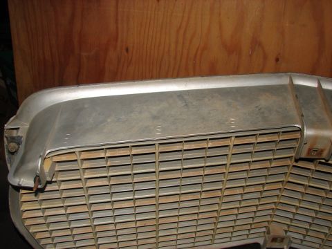 1973 Ford Ranchero - Close-up of a 1973 Ford Ranchero grille, showing its distinctive horizontal bar pattern.