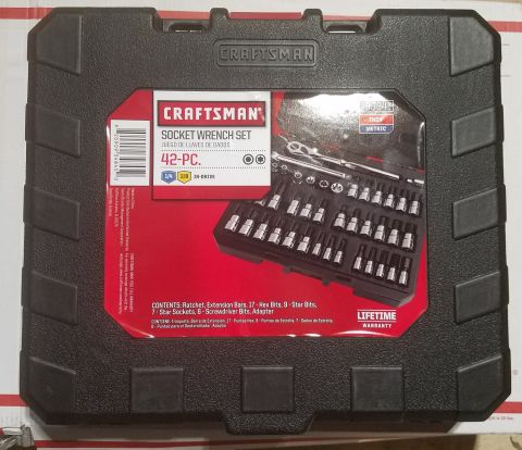 2000 Ford Crown Victoria - This is a Craftsman 42-piece socket wrench set with a ratchet, extension bars, and various sockets.