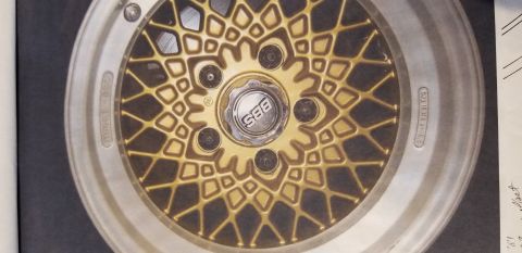 1980 Pontiac Trans Am - A close-up view of a gold BBS mesh wheel with a silver outer rim and center cap.
