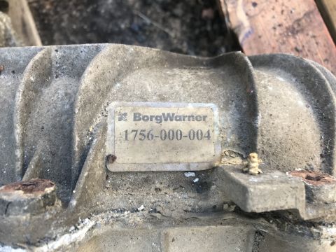 1992 Ford Bronco - A close-up shows a BorgWarner transfer case with a part number visible.