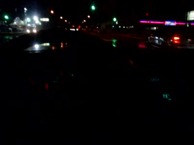 1978 Ford Bronco - Spinning the tires accross a wet intersection..
