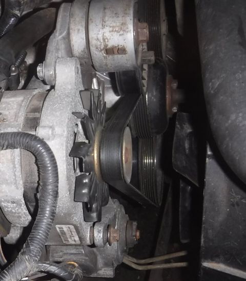1992 Ford Bronco - Smog pump bypassed...later removed once my long shot hope was confirmed that the bigger diameter York pulley, in addition to being offset m…